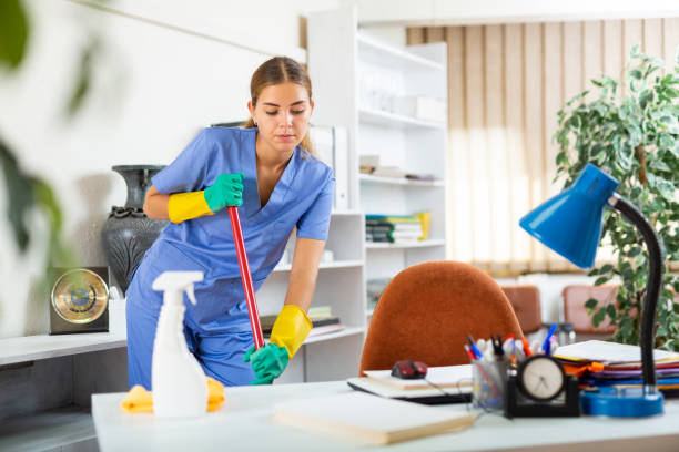 Designing a Health-Friendly Workspace: Your Guide to Well-being 2 Women cleaning the office