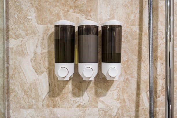 7 Reasons Why You Need A Shower Gel Dispenser In Your Life 2 box-of-soap-shampoo-conditioner-hang-on-wall-in-bathroom